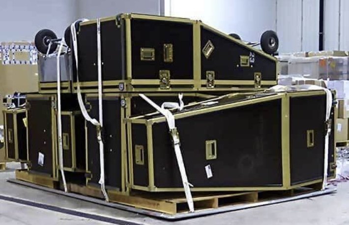 Packed and wrapped flight cases prepared for transit